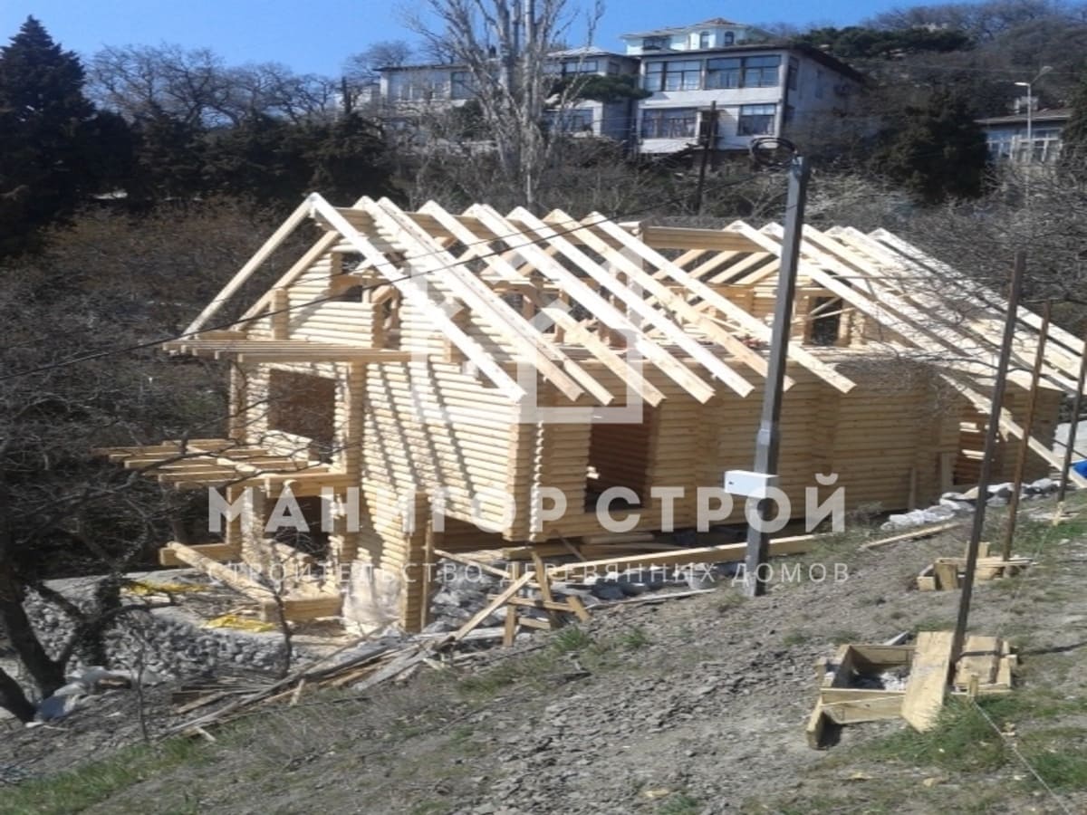 Фотография 1 - Строительство домов из оцилиндрованного бревна